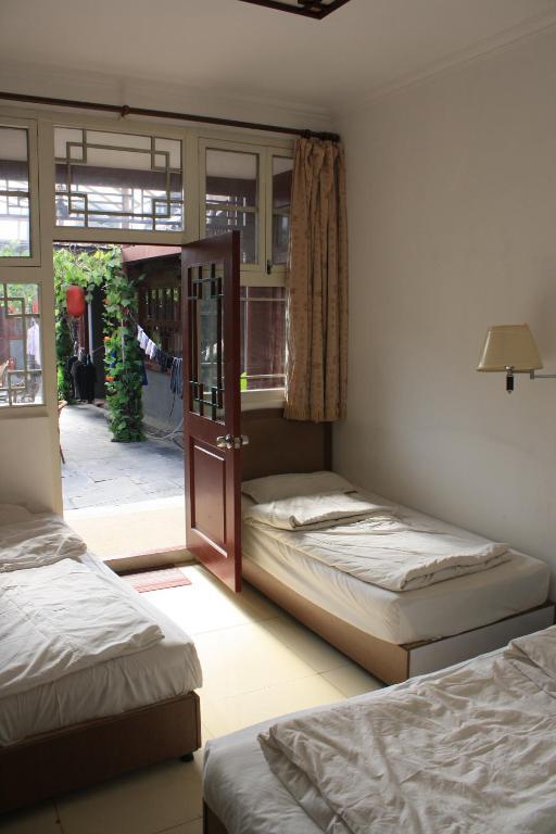 Three Legged Frog Hostel Пекін Номер фото
